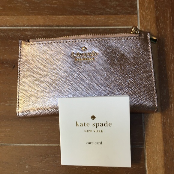 kate spade Handbags - NWT small Kate Spade metallic pink wallet